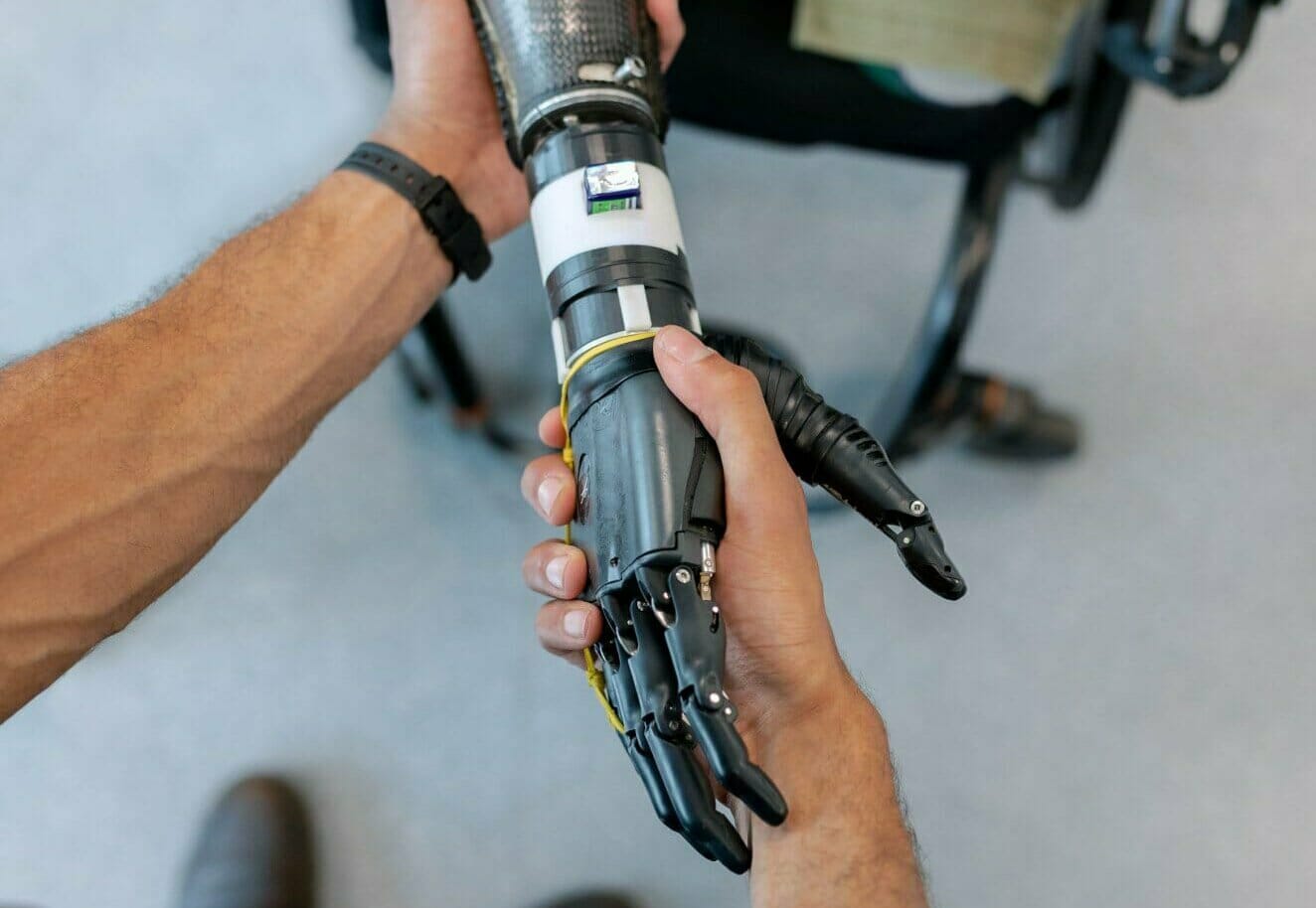 robot shaking hands with human