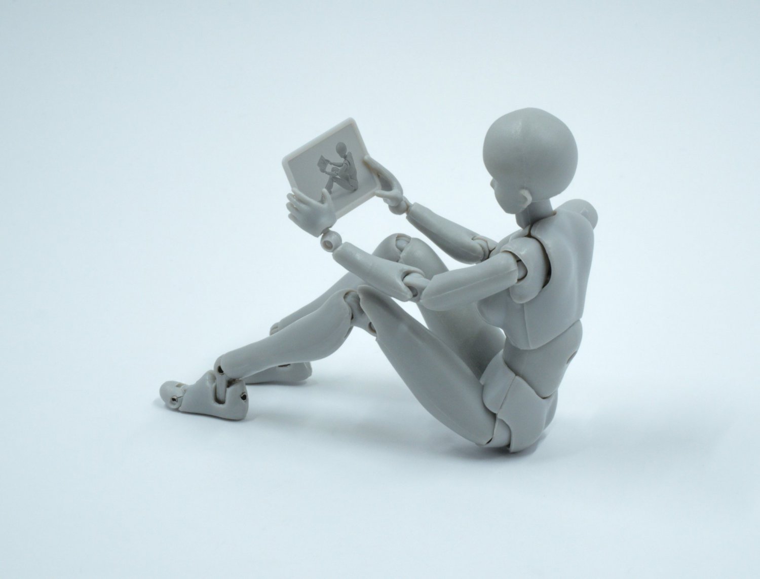 robot sitting on floor