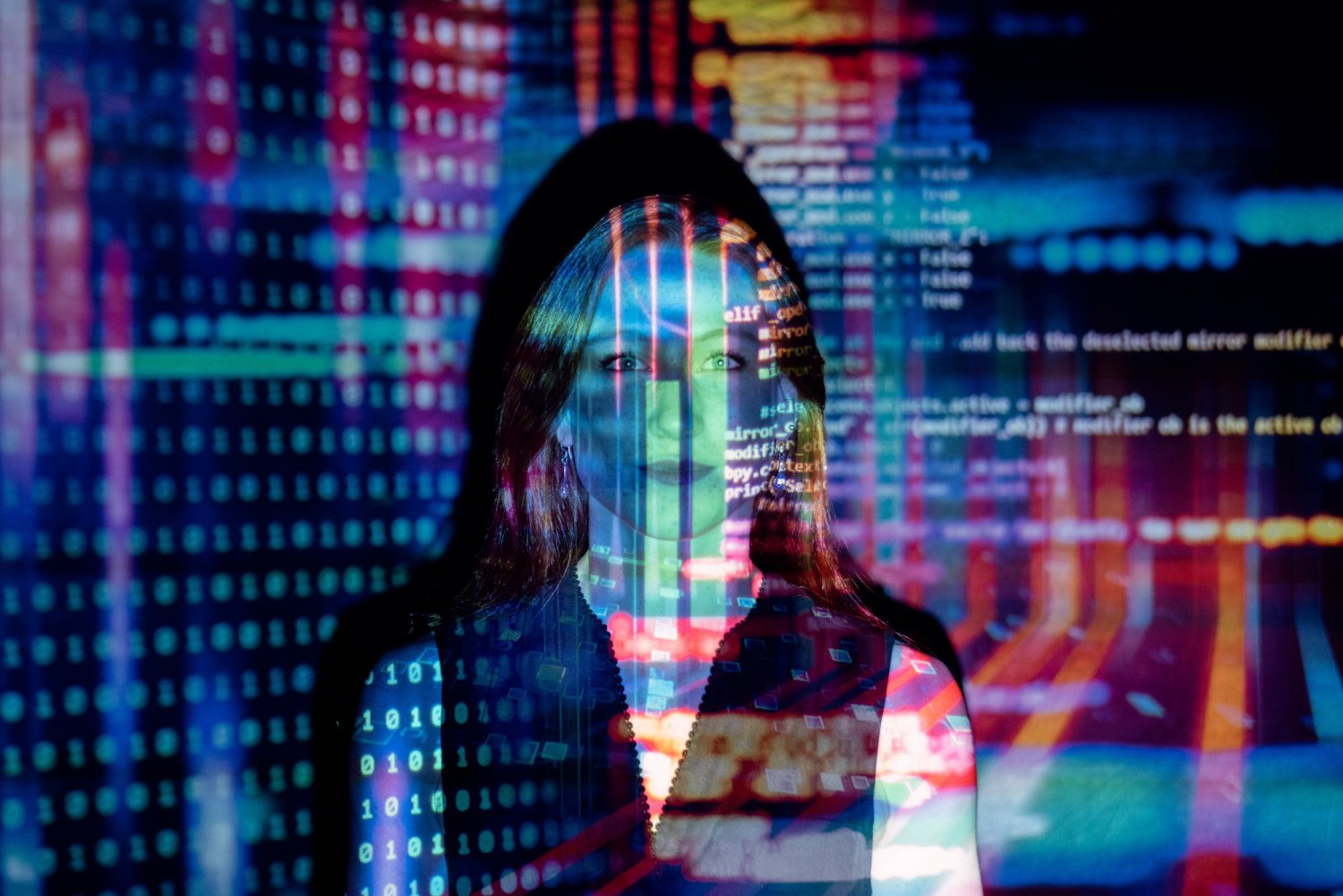 computer code across a woman's face
